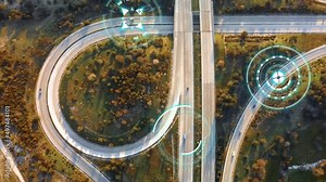 Autonomous Self Driving Cars Moving Through City Highway. Speed and identity Control System. Future transportation. Artificial Intelligence Digitalizes and Analyzes Road. Shot from drone.