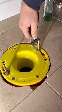 setting a toilet on a new flange extension kit like a real plumber