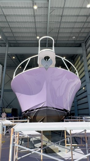 Unique exterior makeover on this 41’ Ronin! 👀🟣 Fun fact: The father and son owners named and repainted the boat as a tribute to their mother/grandmother, Rita. Her favorite color was purple. | Saunders Yachtworks