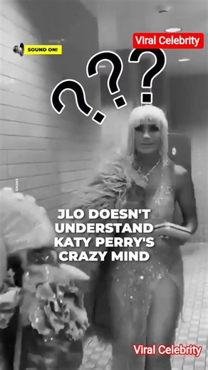 Katy Perry's weird dress caught her attention, and her expression showed how utterly displeased