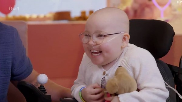 Florence Berk is surprised by her favourite popstar Perrie Edwards