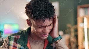 Headache, tension and man in recording studio for sound, streaming and media or production. Pain, listen and audio engineer with stress or burnout for editing and balance of music in creative space