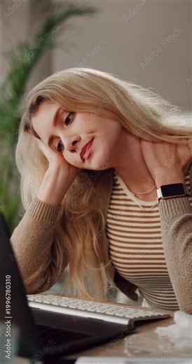Student, tired and woman in home, laptop for online results and fatigue with assignment. Apartment, university and person in lounge, pc and overworked with stress, burnout and bored with assessment
