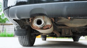 clip-3424551031-car-exhaust-pipe-traces-corrosion-close-up-bottom