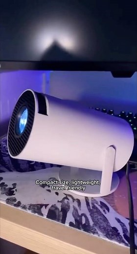 Discover this Mini Portable Projector with Android OS, ~240 ANSI-lumen brightness, and built-in WiFi