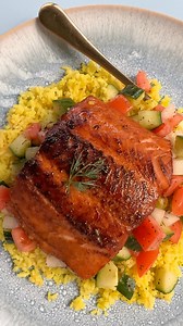“Grilled Salmon with Asian Barbeque Sauce” is a great romantic meal for two or dinner guests. We marinate FRESH SALMON FILLETS in an ASIAN MARINADE from the International aisle. Then, we bake pan sear fillets serve them with YELLOW RICE and an ORGANIC ENGLISH CUCUMBER and ROMA TOMATO salad. | Ingles Markets