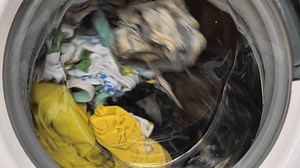 clip-3396044005-close-up-washing-machine-process-wash-clothes