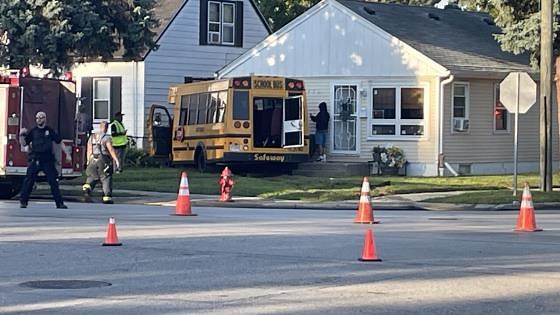 Driver flees after hitting school bus, causing crash into Milwaukee house