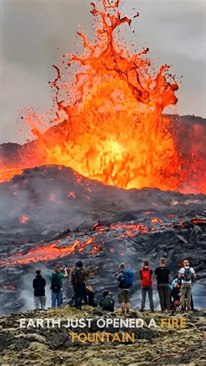 EARTH JUST OPENED A FIRE FOUNTAIN 🌋🔥 That’s a lava fountain eruption .. molten rock blasting into the air like a liquid fireworks show, then raining back down as glowing fragments across fresh black lava fields. This happens when gas-rich magma rises and pressure releases violently, sending fountains of lava dozens of meters high. The splashes you see are called lava bombs .. still molten when they land, slowly cooling into jagged volcanic rock. Scenes like this are often witnessed near active