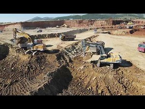 Mine Operations Unveiled: Excavators Clearing the Path to Valuable Ore