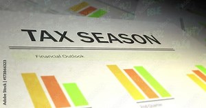 Financial Paperwork with Stock Market Ticker overlay - Tax Season