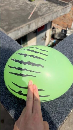 Experiment: Will a water balloon explode if it rolls down a tall building? 💥🎈 #balloon