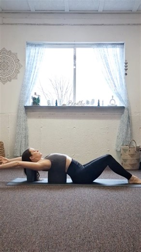 Everyone needs this restorative pose to counteract holding your phone in your hands all day. This supported fish pose is a gentle, yet deep backbend that opens the chest and shoulders while melting stress away ✨️ Settle in while you focus on your breath for 3-5 mins. On your inhales, lift your chest towards the ceiling. On your exhales, rest into the blocks & floor. Save this one! | Mid Coast Yoga