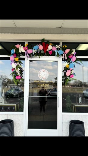 Easter/spring doorway arch at the shop! #easter #spring #storefront #flowershop #flowers 💐🌷🐣🌿🌼🌱🐰🐇