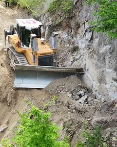 353K views · 5.4K reactions | Cliffside Conquest - Mastering Road Construction with the Liebherr 746 Dozer | Grader Construction | Facebook