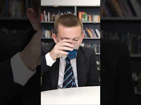 Brits try Warheads Soda!