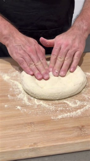 Stretching a dough ball
