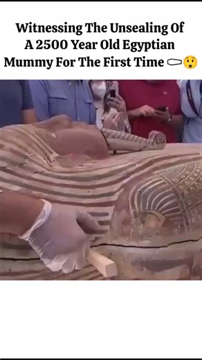 Talk Tune on Instagram: "Unsealing a 2500 Year Old Ancient Egyptian Mummy Sarcophagus in Saqqara Egypt ⚰️✨ #Archaeology #Mummy #History #Viral​#AncientEgypt Ancient Mystery Unveiled! Watch as archaeologists carefully open a pristine wooden sarcophagus discovered in the Saqqara necropolis near Cairo. The moment the lid is lifted, it reveals a perfectly preserved mummy wrapped in burial linens and adorned with an intricate, colorful funerary mask. This sarcophagus has remained sealed for over 2,50