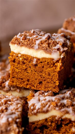 3.7K views · 119 reactions | Pumpkin Coffee Cake ✨ This pumpkin coffee cake is a soft pumpkin cake with a cream cheese layer, cinnamon crumble, and vanilla icing! The perfect cake to eat with your coffee! Get the recipe in my bio! Or googl pumpkin coffee cake Stephanie #pumpkincoffeecake #coffeecake #pumpkincake | Stephanie's Sweet Treats | Facebook