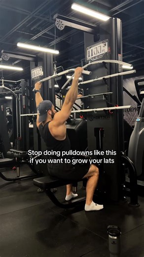 Sebastian Burka on Instagram: "The Proper Way To Do Lat Pulldowns 1 - Don’t sit directly underneath the cable. When you’re directly underneath, it forces you to lean back more, or arch your back in order to pull the bar down. Otherwise you’d hit your head. This shifts the focus to upper back as you’ll be moving more through protraction & retraction, with higher degrees of internal rotation. Scoot a bit further back so that the cable is slightly in front of you. 2 - Don’t just hangout in the seat