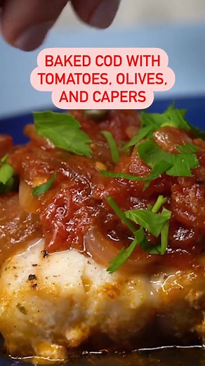 Who said cod is boring? This recipe packs big flavor using sweet-tart tomatoes, briny olives and salty capers. Get the full recipe for Baked Cod With Tomatoes, Olives, and Capers by clicking the link: bit.ly/3LLHaeJ | Real Simple