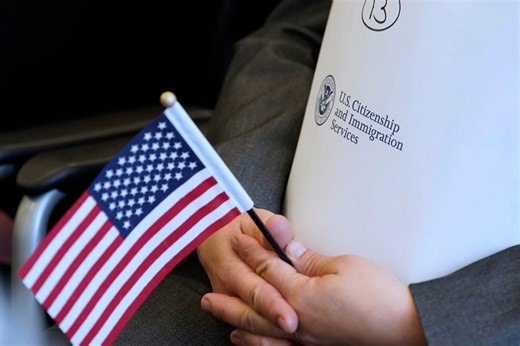 Trump accused of $1b immigration 'fraud' with visa approval freeze