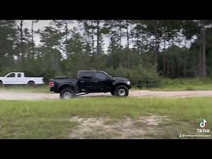 F150 prerunner dancing through whoops.