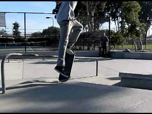 BACKSIDE 50-50 RAIL SLOW MOTION