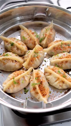 Viraj Naik on Instagram: "Perfect Momo Recipe at home 🥟 After watching countless videos and experimenting with different folds & fillings I’ve finally cracked the secret to soft outer dough and juicy flavorful stuffing 😍 Special thanks to @nehadeepakshah for the amazing dough technique I picked up from her video ( momo recipe, veg momos, street style momos, homemade momos, momos chutney ) #MomoRecipe #Momos #VegMomos #SteamedMomos #MomosLovers #MomosAtHome #MomosRecipe #MomosFilling #MomosMaki