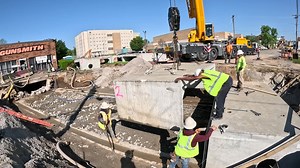 Work is progressing quickly on the S. Water culvert project. Today, crews are using a large crane to install pre-cast bridge structures, an important step toward reconstructing the stream crossing. | Gallatin City Government