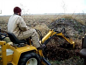 Cub Cadet Backhoe in action