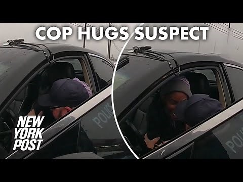 Touching bodycam footage shows cop hugging scared suspect after chase | New York Post