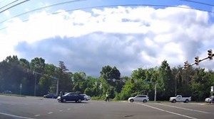 Distracted driving? See the reaction after a driver hits a Fairfax County police officer