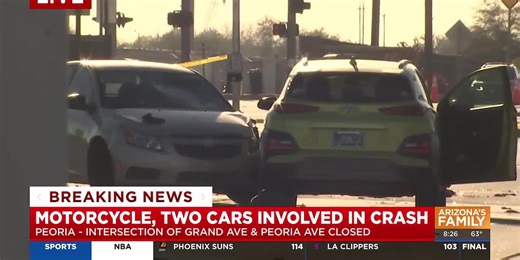 Motorcycle hospitalized after crash that closed Peoria intersection