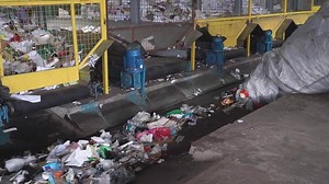 Pressed containers of plastic bottles and household containers