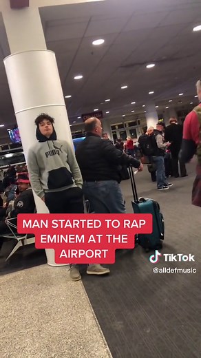 Man Raps Eminem at Airport