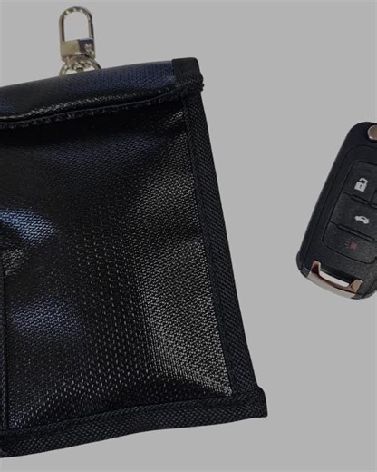 HOLDCOM AUTO PARTS on Instagram: "Ever parked your car and wondered if your key fob's signal is still broadcasting? That quiet vulnerability is what keeps modern thieves busy. Our RFID Blocking Key Pouch is your silent guardian. Slip your remote inside, roll it closed, and instantly create a signal-free zone. It's not just a pouch—it's peace of mind for push-button start vehicles. Simple, sleek, and essential. Protect what drives you. #HoldcomAutoParts #RFIDProtection #CarSecurity #KeyFobProtect