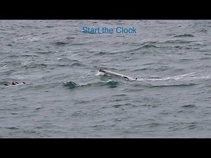 Surfski remount in strong tidal flow and bumpy seas.