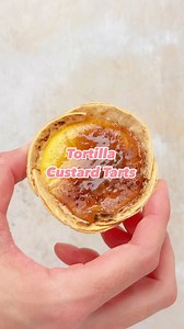 Pastry-free custard tarts? Yes, please! These tortilla custard tarts are crispy, creamy, and easy to make. Swap pastry for tortillas (baked until crispy) and fill with custard and cinnamon sugar for a Christmas twist. Then top with ordinary caster sugar and bake until golden. Finish with a blowtorch (or hot spoon) for a caramelised top. A lighter twist on a classic treat! #Custardtarts #BakingIdeas #christmasdessert #CreativeDesserts #TartTwist #tortillas | The Fast Foodie