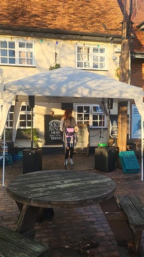 Kyri has brought the sunshine to our Christmas light switch-on day! ☀️✨ She’s one of our regular favourites here at The Dolphin, and if you’re passing by you’ll soon hear why! Pop in while you’re out and about — we’ve got stalls at the back of The Dolphin and plenty of festive cheer waiting for you! 🎄🍻 | The Dolphin Newport Pagnell