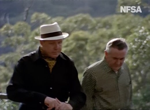 Happy World Animal Day! What better way to celebrate than with that most famous of Australian animal characters, Skippy the Bush Kangaroo? In this clip, Skippy has been captured by the nefarious animal collector Doctor Stark. Frank Thring plays the Doctor as a Bond-villainous dandy with an affected accent, a cravat, a cigar and a Panama hat, who lives in a mansion and orders his lackeys about. His arrogance and pretension form a marked contrast to the salt-of-the-earth types that form Skippy’s e