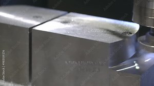 The milling process on CNC milling machine. The metal working concept on the milling machine.