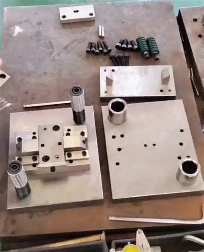 180K views · 1K reactions | Assembling a simple stamping mold step by step. Every detail counts — alignment, fitting, and testing all play a key role in performance. How do you ensure precision in your tooling process?  #Stamping #ToolAssembly #Metalwork #EngineeringLife #Manufacturing | Dongguan Daxing Precision Hardware Co., Ltd. | Facebook