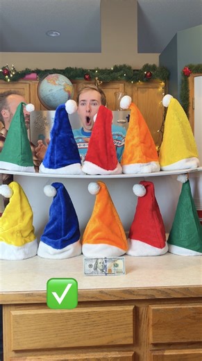 Santa Hat Matching Challenge 🎅🏻 Dad and kids play funny Christmas matching game in their kitchen. Match all the different colored Santa Claus hats for the ultimate cash prize. This video was produced by Paul & Kezzy, Network Media, and Benson Bros. | Paul & Kezzy