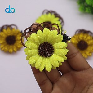 58K views · 2.2K reactions | In this inspiring DIY tutorial, we'll guide you through the process of creating beautiful flowers using glitter foamiran. Foamiran is a versatile material that allows you to craft stunning and realistic-looking flowers. Whether you're a crafting enthusiast or looking to add a touch of elegance to your space, this tutorial will help you create exquisite handmade foam flowers. #diy #craft #flowers | DIY Crafts & Art | Facebook