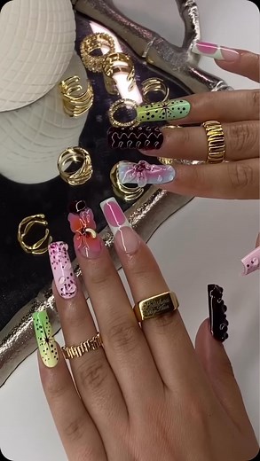 3D nail art is one of the top global nail trends at the moment, and this funky sculpted floral nail art from @polished.by.asia is a perfect look for the summer! 🌸🩷 🔗 To learn more about how you can up your 3D skills with four tips, click the link in our stories! #sculptedflorals #3dflowersnails #3dnails #3dnailart #auranails #summernails #texturednails | Nailpro