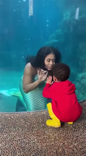 Aunty Acid on Instagram: "Spellbound at the glass: mermaid meets childhood wonder 🧜‍♀️✨"