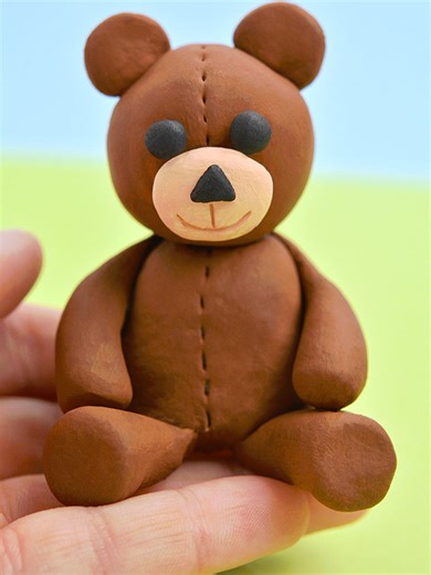 This clay bear is SO CUTE and so easy to make! Use air dry clay, your hands, and a toothpick to sculpt this adorable clay teddy bear. This is a fun craft for beginners to working with clay – No special tools are required! #clay #claycrafting #claycraftideas #claybears #easyclaycraft #bearcraft #airdryclay