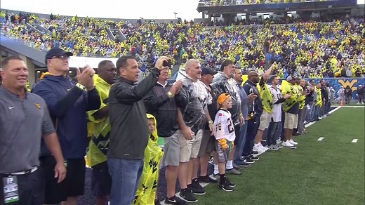 Following the first quarter, the 1988 team was recognized for its 30-year anniversary of an undefeated regular season and national championship appearance. | WVU Football