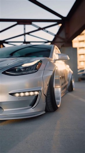 Widebody fenders transform plain Model 3 into silver street beast，Front flared arches + rear fenders